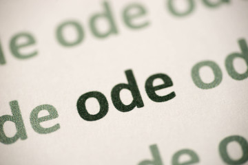 word   ode printed on paper macro