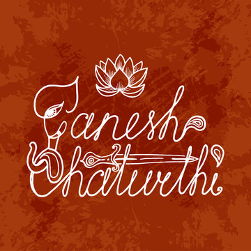 Ganesh Chaturthi. Indian festival. Handmade text. Elephant head, paisley, dagger, lotus. Dark grunge background