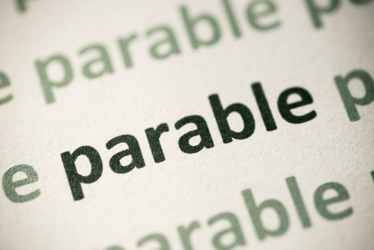 word parable printed on paper macro