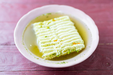 Instant noodles? in a dish filled with boiling water.