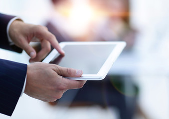 closeup.businessman with tablet computer