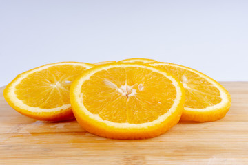 Orange fruit slice. Selective focus and crop fragment