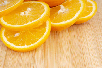 Orange fruit slice. Selective focus and crop fragment