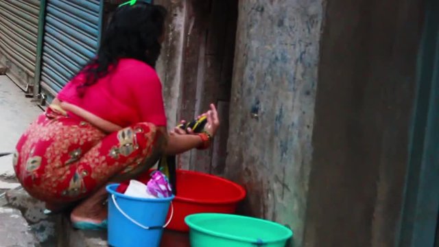 Nepali local washing clothes