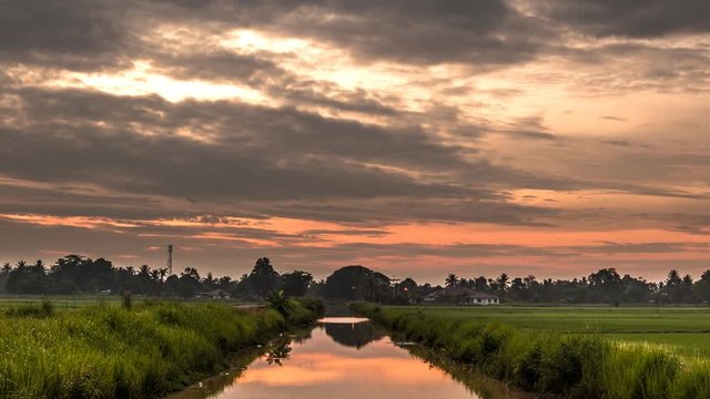 Timelapse of a village in Alor Setar during sunrise.