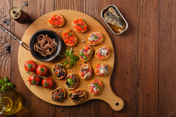 Mix Bruschetta with sardines and anchovies.