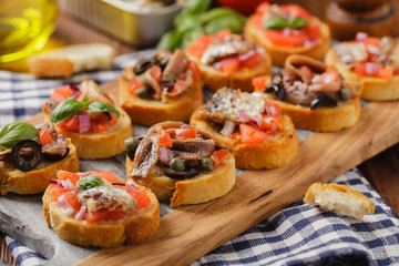 Mix Bruschetta with sardines and anchovies.