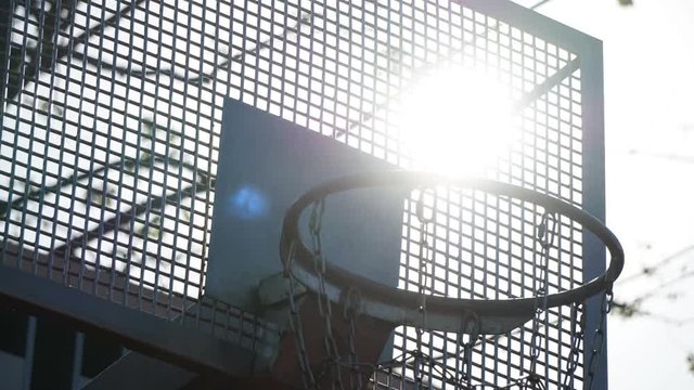 Timelapse of sunrise on streetball court