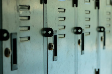 Close up shot of old lockers in school. It was memory of many people. Lonely concept. Locker room.