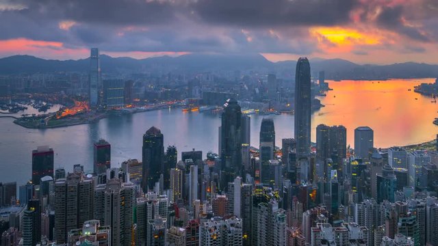 4k timel;aspe day to night sunrise scene of hongkong cityscape view from victoria peak, hongkong