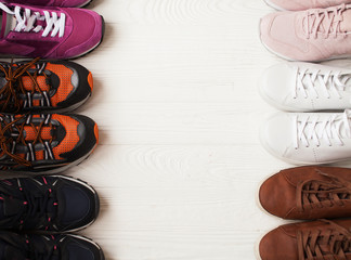 Shoes on the wooden shelf in the store