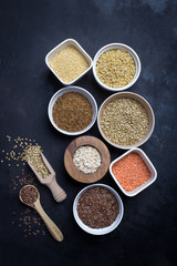 Mixed grains on dark background; overhead view