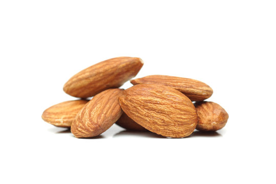 A pile of almond isolated on white