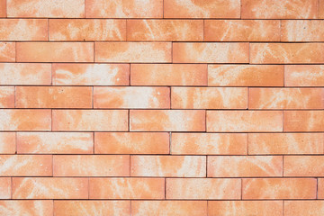 Orange brick wall background with pattern