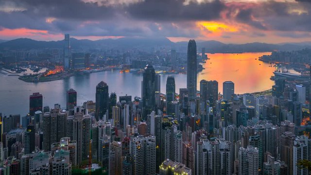 4k timel;aspe day to night sunrise scene of hongkong cityscape view from victoria peak, hongkong