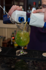 bartender preparing a cocktail