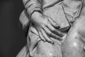 Stone statue detail of human hand