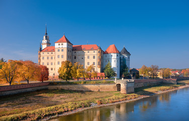 Obraz premium Hartenfels castle in Torgau, a town on the banks of the Elbe river in Germany