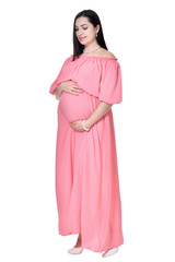 Beautiful pregnant woman in pink dress