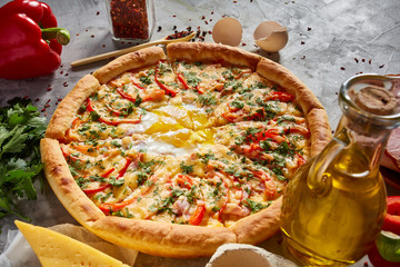 Tasty Italian pizza and its ingredients on white textured background.
