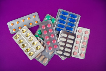 the group of color medical pills in packages