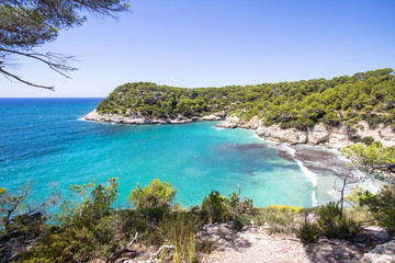 Fototapeta na wymiar Panorama view of Cala Mitjana, Menorca, Spain