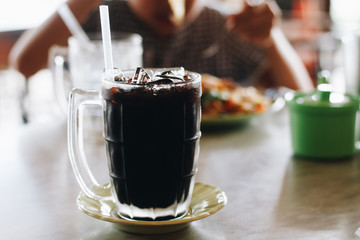 Iced Black Coffee / Iced Black Coffee In Clear Glass On A Thirsty Day.