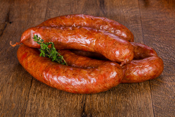 Pork sausages over wooden