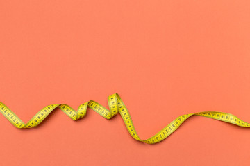 Yellow plastic measuring tape top view