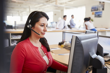 Hispanic woman working in a call centre