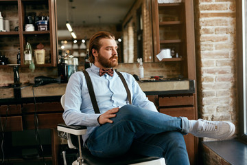 Male Barber Portrait In Men Hair Salon