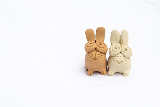 Cute little rabbit clay doll isolate on white background, Easter concept background