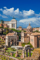 Ancient ruins, classical monuments and baroque church in the historic center of Rome (with copy space above)