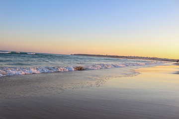 Sunset in Praia de Albandeira - beautiful coast of Algarve at sunset, Portugal