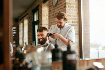 Barber Shop. Man Getting Haircut In Hair Salon