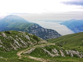 Fototapeta premium Lake Garda, Italy, July - hiking in beautiful landscape to Altissimo- great view to Lake Garda - summer day, Italy