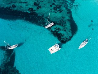 Aerial: Yachts in the azure water