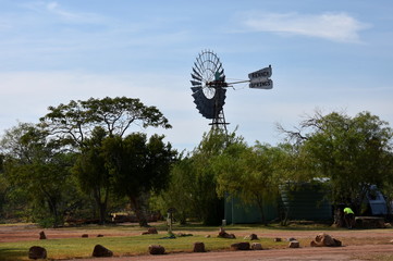 Renner Springs, Australia - Jun 13, 2018. A windmill stands in outback rural Australia, at the Renner Springs Desert Inn.