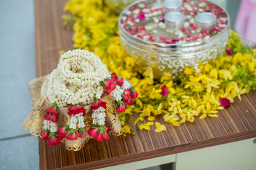 Close-up Pour water on the hands of revered elders and gives blessing in Songkran day Thailand