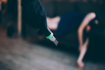 Wicked and evil murderer attempt to kill a woman in danger with a knife cutter - homicide and...