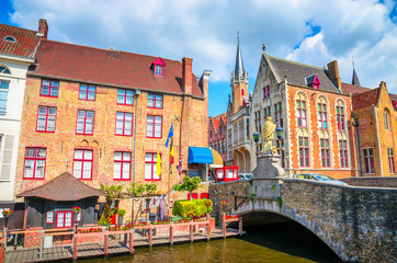 Beautiful canal and traditional houses in the old town of Bruges (Brugge), Belgium