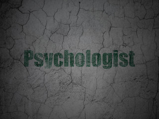 Health concept: Green Psychologist on grunge textured concrete wall background