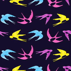 Coloful seamless pattern with watercolor swallows silhouettes.