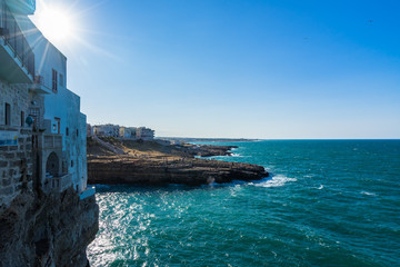 Polignano a Mare is a famous town built on rocky cliffs overlooking the Adriatic Sea, Apulia, Italy