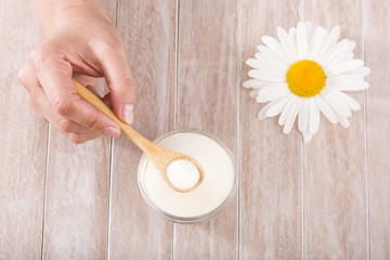 Collagen protein powder in the spoon - Hydrolyzed.