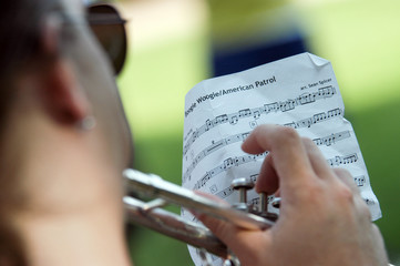 Trumpet player during marching band rehearsal on field, Stillwater, Oklahoma © Julian