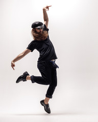 Fototapeta premium Young beautiful dancer posing in the studio