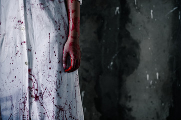 bloody hand of Ghost woman in the dark. nightmare, horror of scary fear on hell is monster devil in...