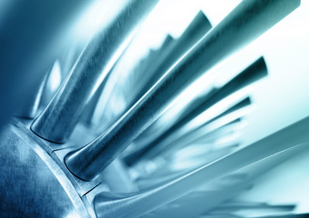 Blue abstract industrial background. 3d rendering of gas turbine rotor blades.