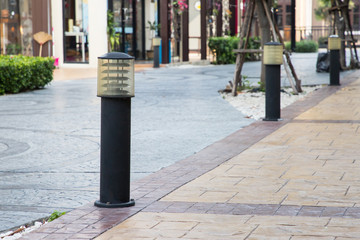 light steel bollards on path way.